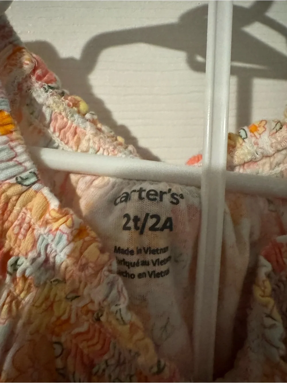 Carter's Floral Smocked Cap-Sleeve Top in Peach, Yellow and White